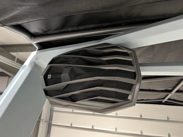 Slide: The Image of 2025 Nautique Super Air Nautique G25 speaker detail in a modern boat interior. - 36