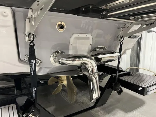 Slide: The Image of 2025 Nautique Super Air Nautique G25 boat interior, top view, showcasing seating and layout. - 5