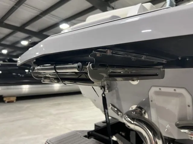 Slide: The Image of 2025 Nautique Super Air Nautique G25 boat, sleek design, light blue and white color scheme. - 6