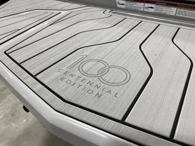 Slide: The Image of 2025 Nautique Super Air Nautique G25 boat, sleek design, light blue and white color scheme. - 7