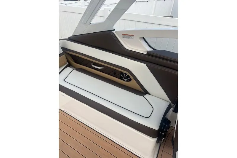 Slide: The Image of 2023 Yamaha Boats 275SDX interior seating with sleek design and modern upholstery. - 28