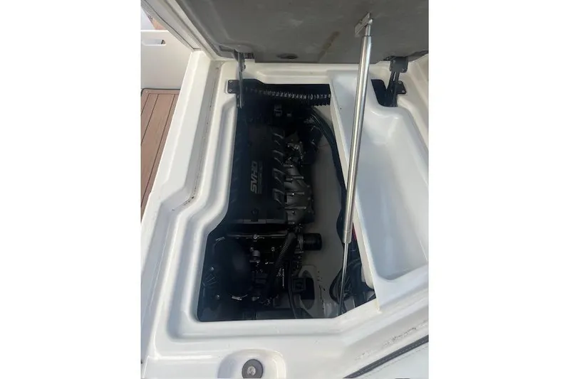 Slide: The Image of 2023 Yamaha Boats 275SDX engine compartment, showcasing powerful motor components. - 38