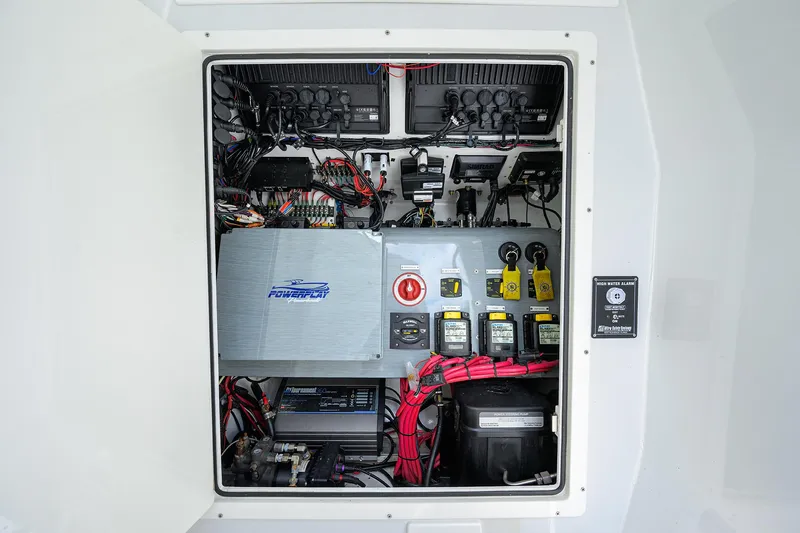 Slide: The Image of 2023 Powerplay Powerboats 30 RumRunner electrical system with wiring and components. - 20