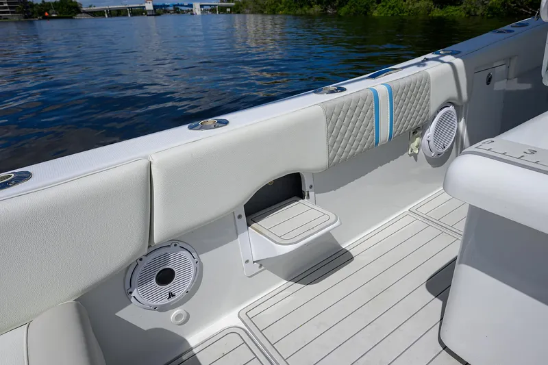 Slide: The Image of 2023 Powerplay Powerboats 30 RumRunner interior with sleek seating and modern design. - 27
