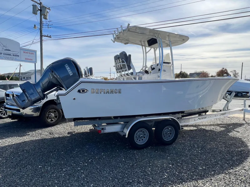 The Image of 2025 Defiance Catalina 240 boat on trailer, parked outdoors. - 0