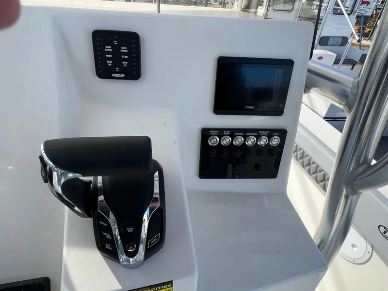 Slide: The Image of Control panel of 2025 Defiance Catalina 240 boat with modern navigation equipment. - 25