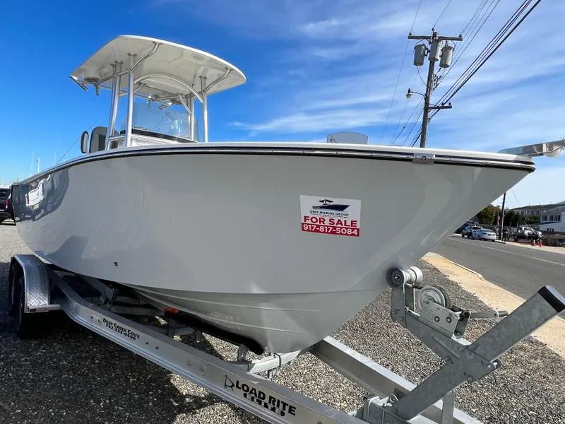 Slide: The Image of 2025 Defiance Catalina 240 boat for sale on trailer, clear sky background. - 3