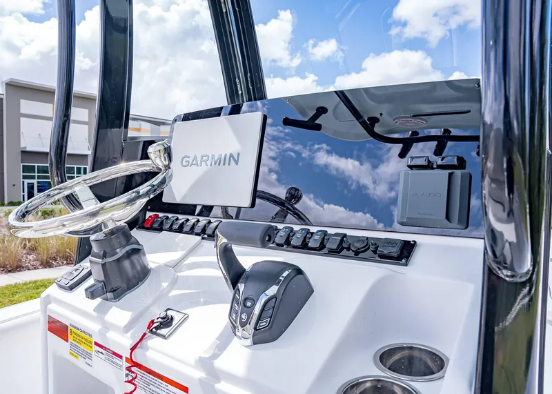 Slide: The Image of 2025 Sea Hunt BX 25 FS boat dashboard with Garmin navigation system. - 12