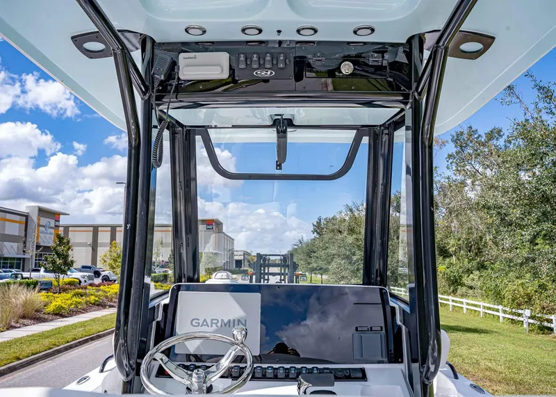 Slide: The Image of 2025 Sea Hunt BX 25 FS boat console with Garmin navigation system. - 8