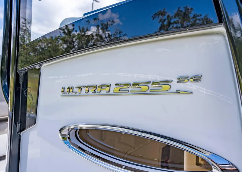 Slide: The Image of 2025 Sea Hunt Ultra 255 SE boat logo detail. - 15