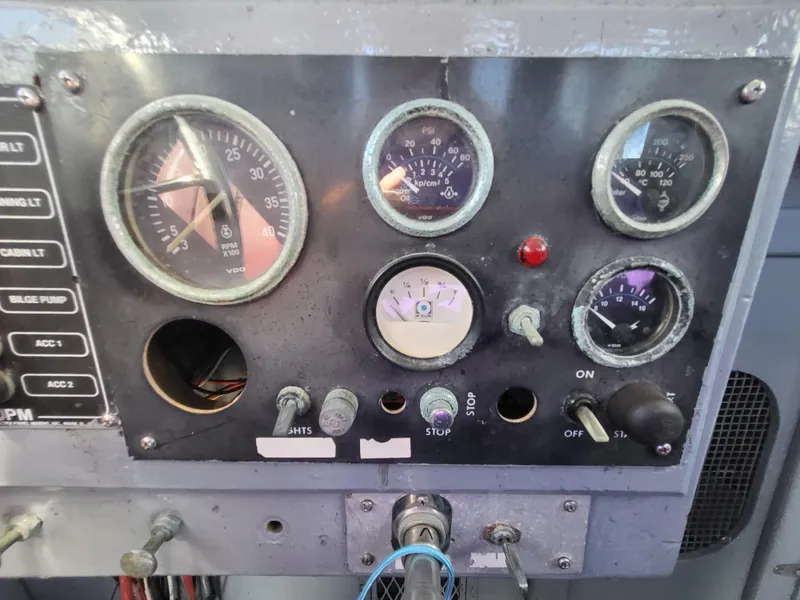 Slide: The Image of Control panel of a 1985 Kinnamon Pilot House Chesapeake Deadrise boat. - 22