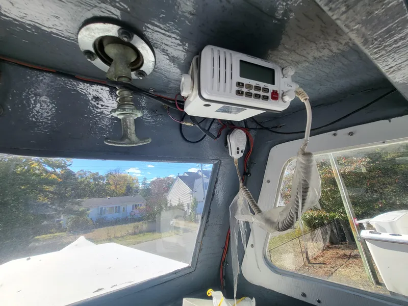 Slide: The Image of Interior of 1985 Kinnamon Pilot House Chesapeake Deadrise with radio equipment. - 23