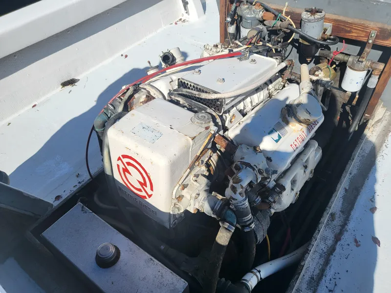 Slide: The Image of 1985 Kinnamon Pilot House Chesapeake Deadrise engine in boat compartment. - 7
