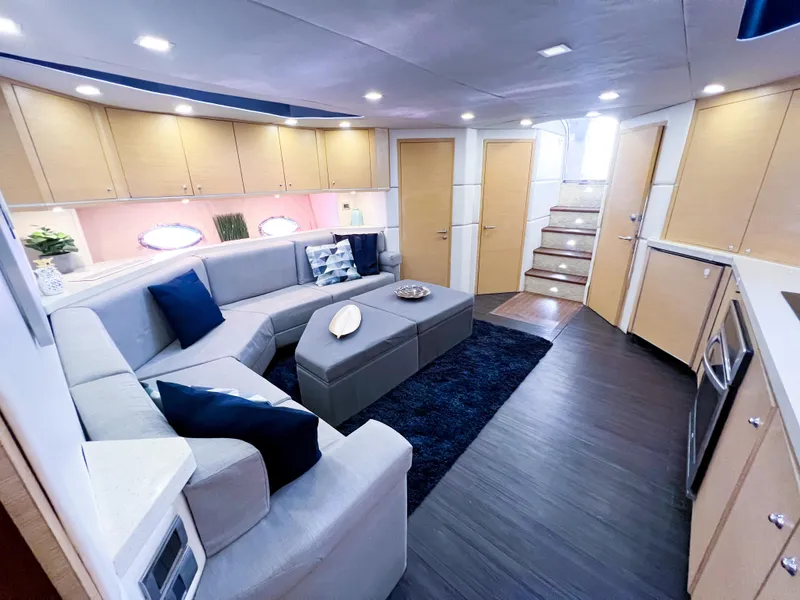 Slide: The Image of Luxurious interior of 2005 Sunseeker Predator 68 yacht with modern seating and elegant design. - 4