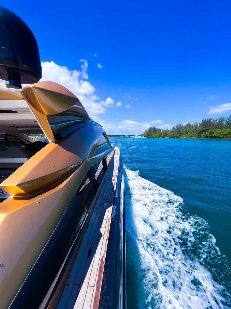 Slide: The Image of Sunseeker Predator 68 yacht cruising on clear blue waters, 2005 model. - 40