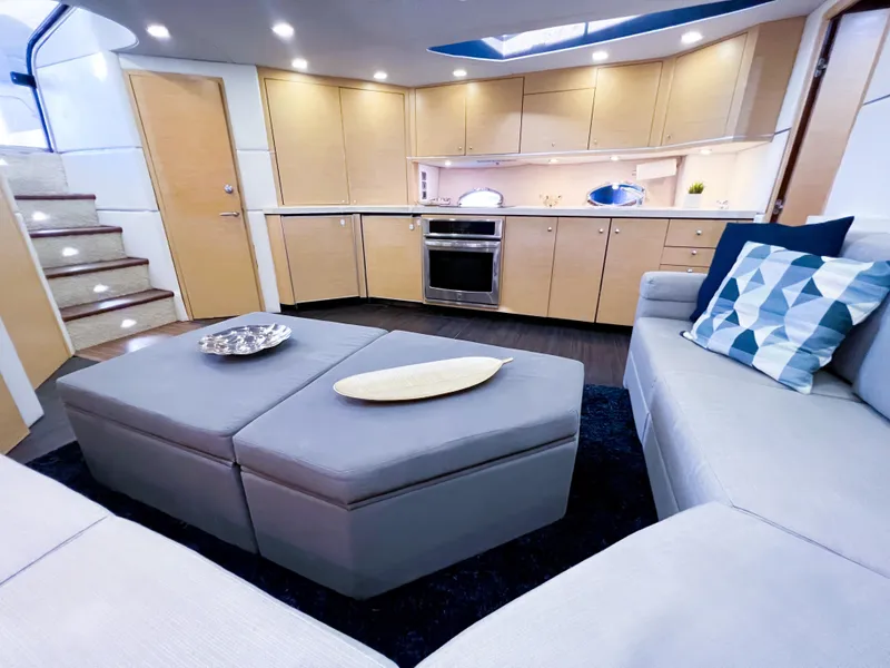 Slide: The Image of Luxurious interior of 2005 Sunseeker Predator 68 yacht with modern kitchen and seating area. - 6