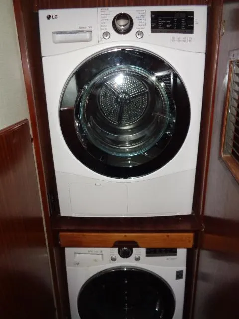 Slide: The Image of Stacked LG washer and dryer in 1989 Hatteras 67 Cockpit Motor Yacht. - 28