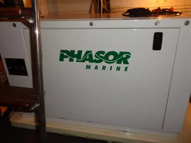 Slide: The Image of Phasor Marine generator on 1989 Hatteras 67 Cockpit Motor Yacht. - 39