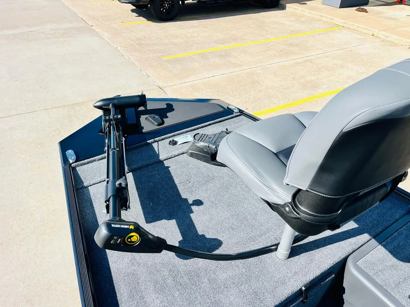 Slide: The Image of 2025 Tracker Bass Tracker Classic XL boat with gray seating and trolling motor. - 10