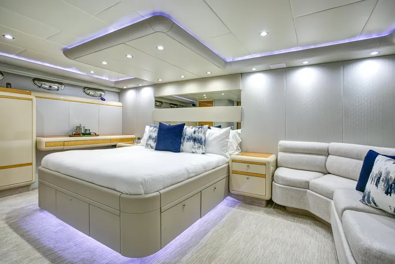 Slide: The Image of Luxurious bedroom interior of 1994 Lazzara 76 yacht with modern lighting and elegant furnishings. - 16