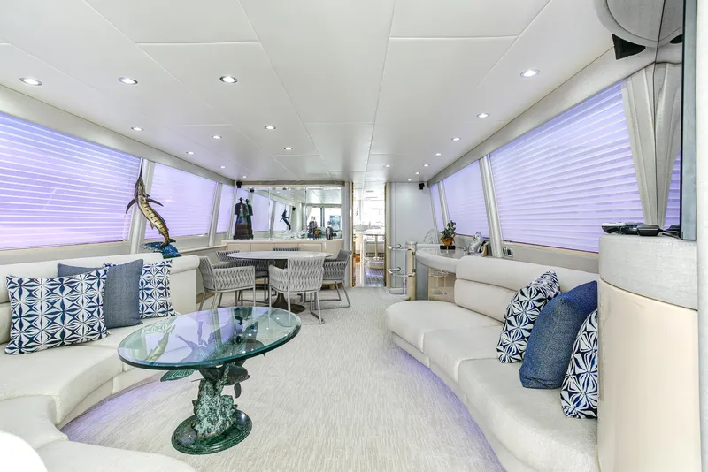 Slide: The Image of Luxurious interior of 1994 Lazzara 76 yacht with elegant seating and decor. - 4
