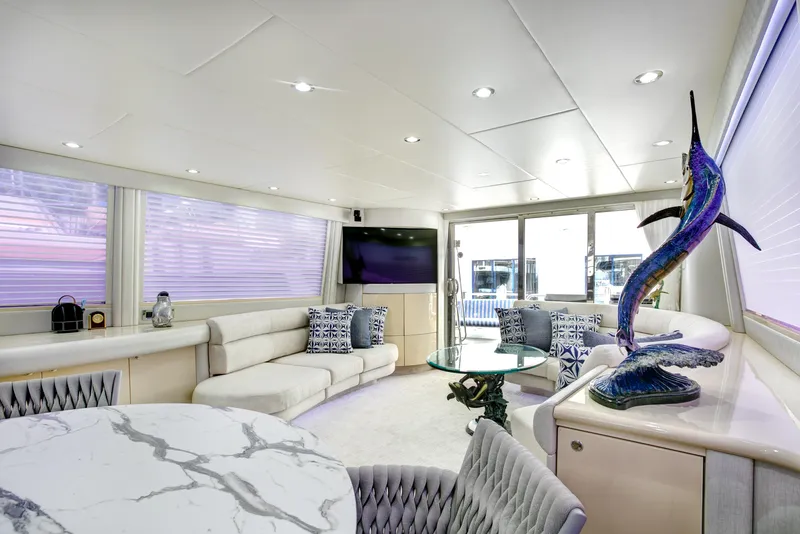 Slide: The Image of Luxurious interior of a 1994 Lazzara 76 yacht with elegant seating and decor. - 6