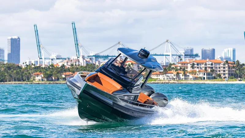 Slide: The Image of Capelli STRADIVARI 43 boat cruising in vibrant coastal waters, 2025 model. - 22