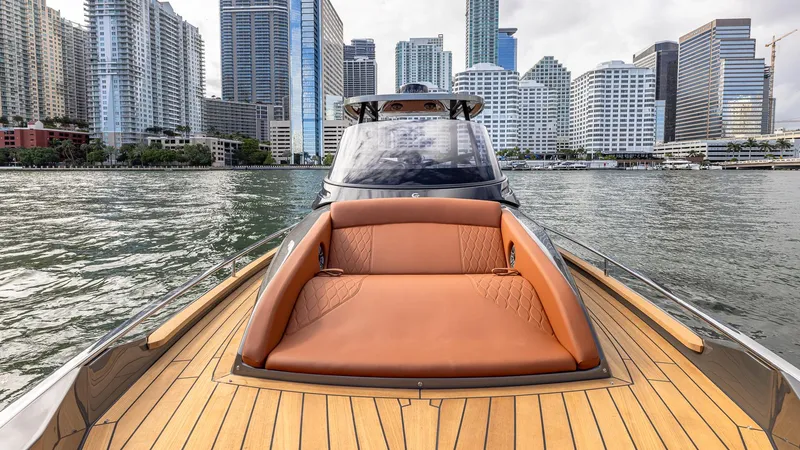 Slide: The Image of 2025 Capelli STRADIVARI 43 yacht with city skyline in background. - 24