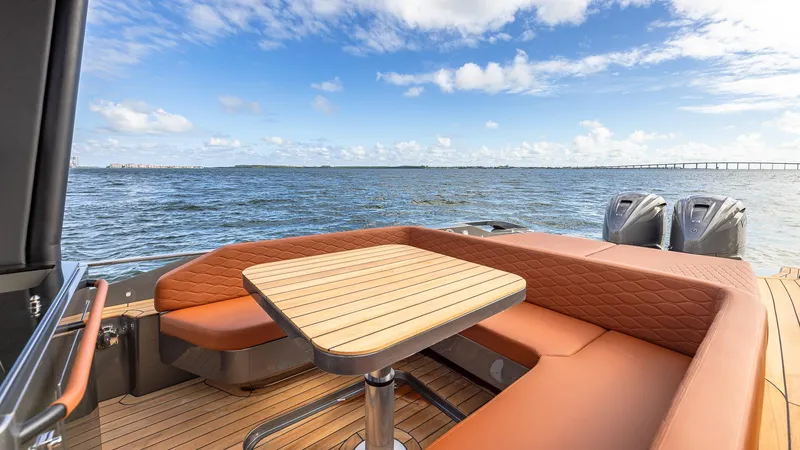 Slide: The Image of Luxury seating area on 2025 Capelli STRADIVARI 43 yacht with ocean view. - 33