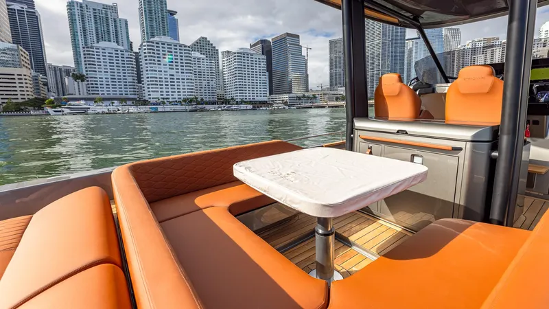 Slide: The Image of Luxurious 2025 Capelli STRADIVARI 43 yacht interior with city skyline view. - 34