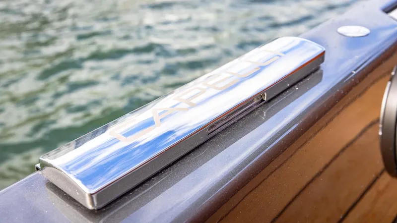 Slide: The Image of Capelli STRADIVARI 43 boat detail, 2025 model, with water in the background. - 41