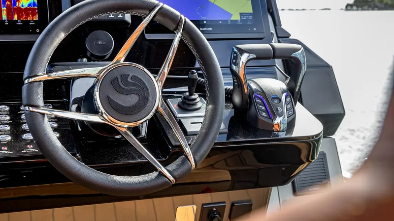 Slide: The Image of Capelli STRADIVARI 43, 2025 model, luxury boat steering wheel and controls. - 45