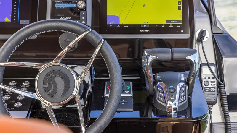 Slide: The Image of Capelli STRADIVARI 43, 2025 model, yacht steering wheel and control panel. - 46