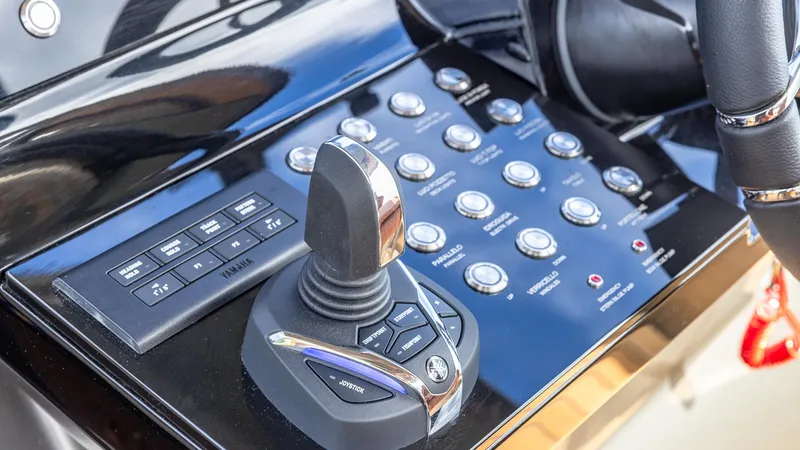 Slide: The Image of Control panel of 2025 Capelli STRADIVARI 43 boat with joystick and buttons. - 47