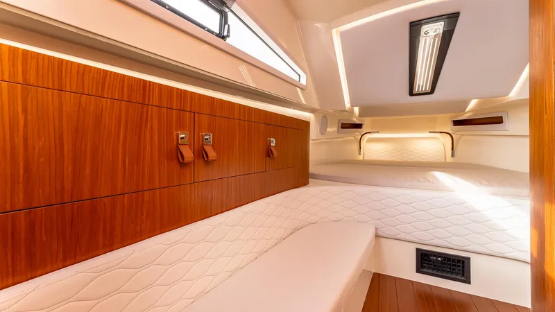 Slide: The Image of Luxurious interior of 2025 Capelli STRADIVARI 43 yacht with elegant wood finish. - 48
