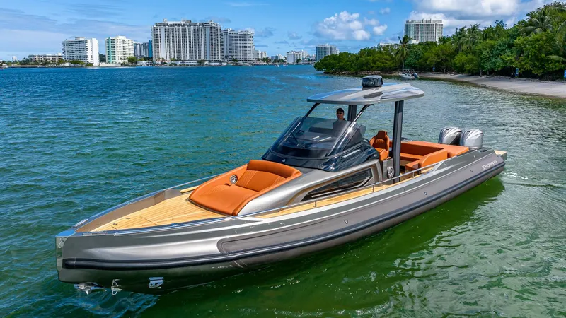 Slide: The Image of 2025 Capelli STRADIVARI 43 luxury boat on scenic waterfront. - 7