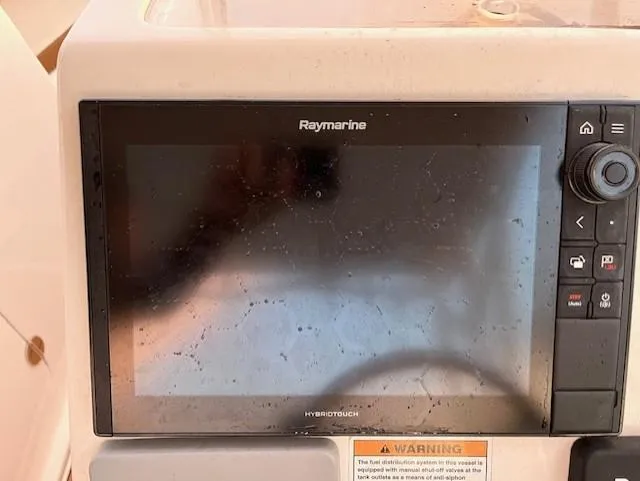 Slide: The Image of Raymarine display on 2020 Century 24 Resorter boat dashboard. - 10