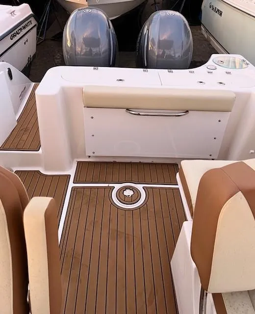Slide: The Image of 2020 Century 24 Resorter boat interior with teak flooring and dual engines. - 15