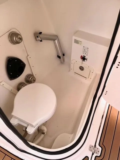 Slide: The Image of 2020 Century 24 Resorter boat bathroom interior with toilet and fixtures. - 18