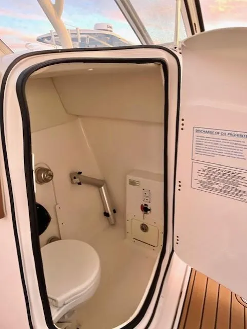 Slide: The Image of 2020 Century 24 Resorter boat interior with compact marine toilet. - 19