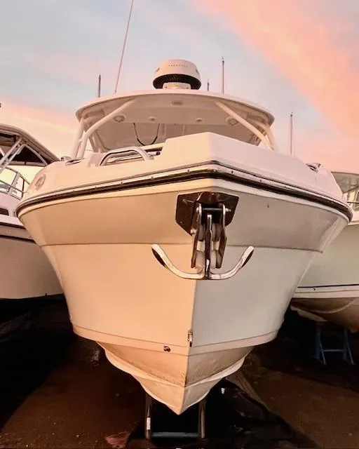 Slide: The Image of 2020 Century 24 Resorter boat with sunset backdrop, front view. - 4