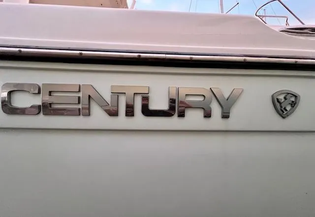 Slide: The Image of Century 24 Resorter 2020 boat logo on white hull. - 5