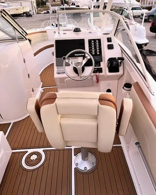 Slide: The Image of 2020 Century 24 Resorter boat interior with modern helm and seating. - 7