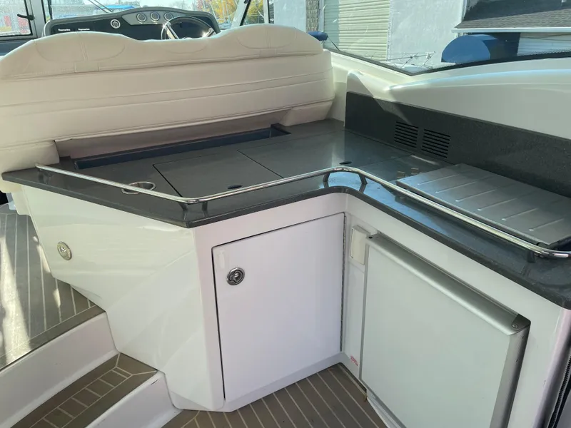 Slide: The Image of Interior of 2014 Formula 45 Yacht with sleek kitchenette and seating area. - 10