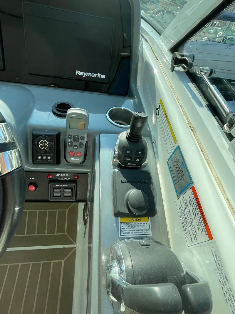 Slide: The Image of Control panel of a 2014 Formula 45 Yacht with Raymarine equipment. - 11