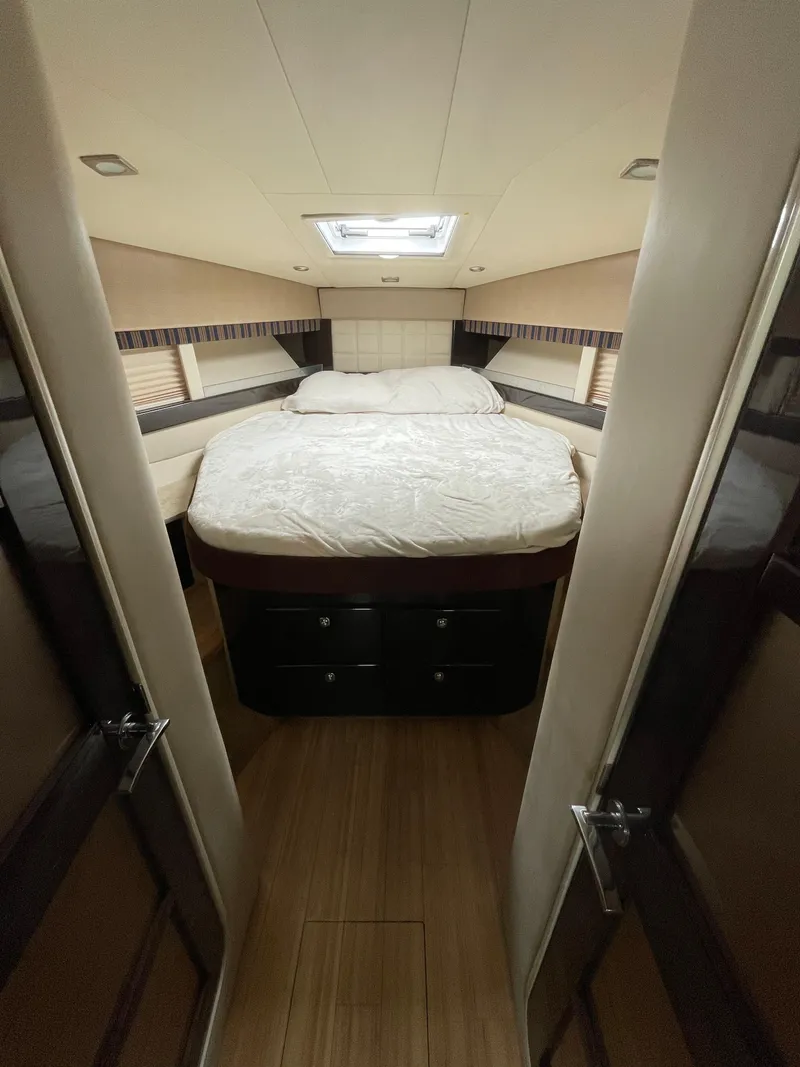 Slide: The Image of Luxurious bedroom interior of a 2014 Formula 45 Yacht with elegant wood flooring. - 13