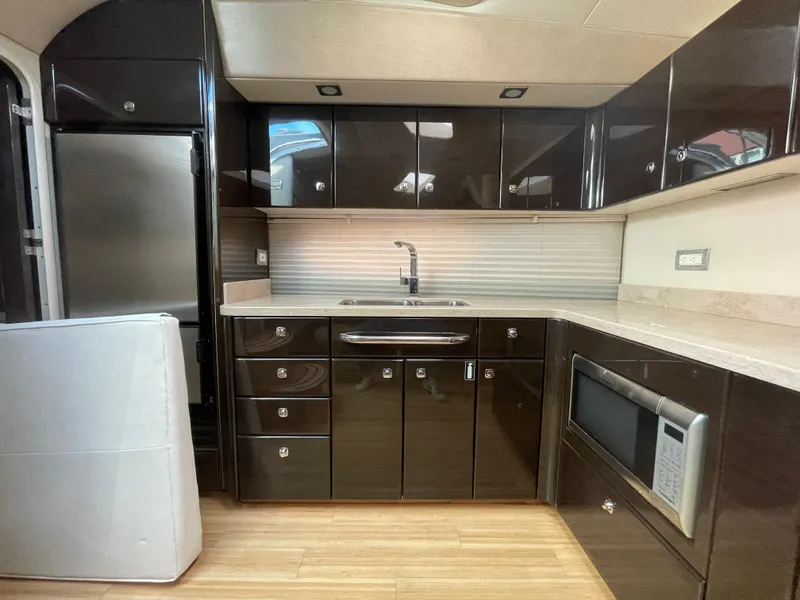 Slide: The Image of Luxurious kitchen interior of 2014 Formula 45 Yacht with modern appliances and sleek cabinetry. - 16