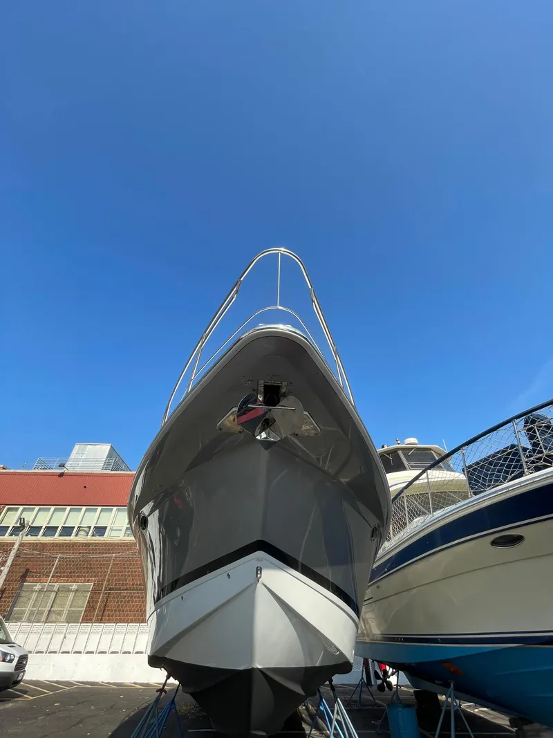 Slide: The Image of 2014 Formula 45 Yacht on display under clear blue sky. - 18