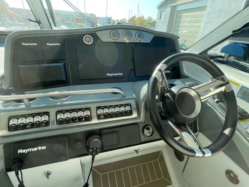 Slide: The Image of Control panel of a 2014 Formula 45 Yacht with Raymarine navigation system. - 22