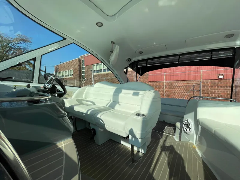 Slide: The Image of Interior of 2014 Formula 45 Yacht with white seating and modern design. - 4